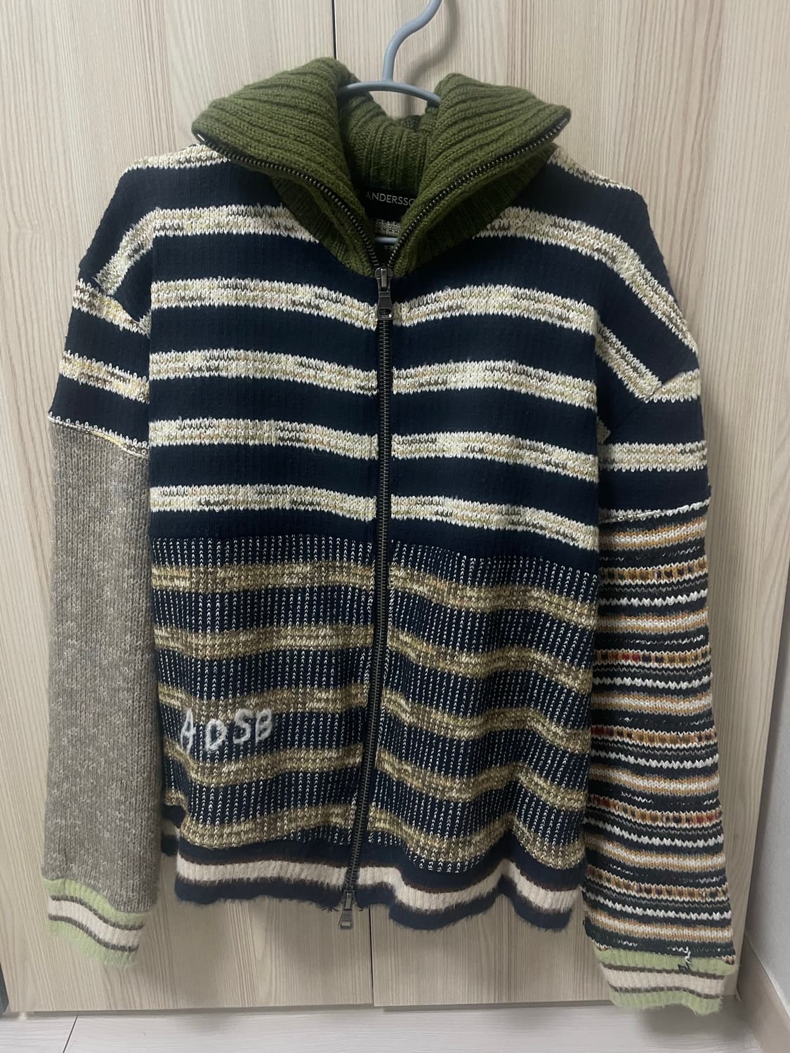 앤더슨벨 브리프텐 패치워크 니트집업 상품이미지1