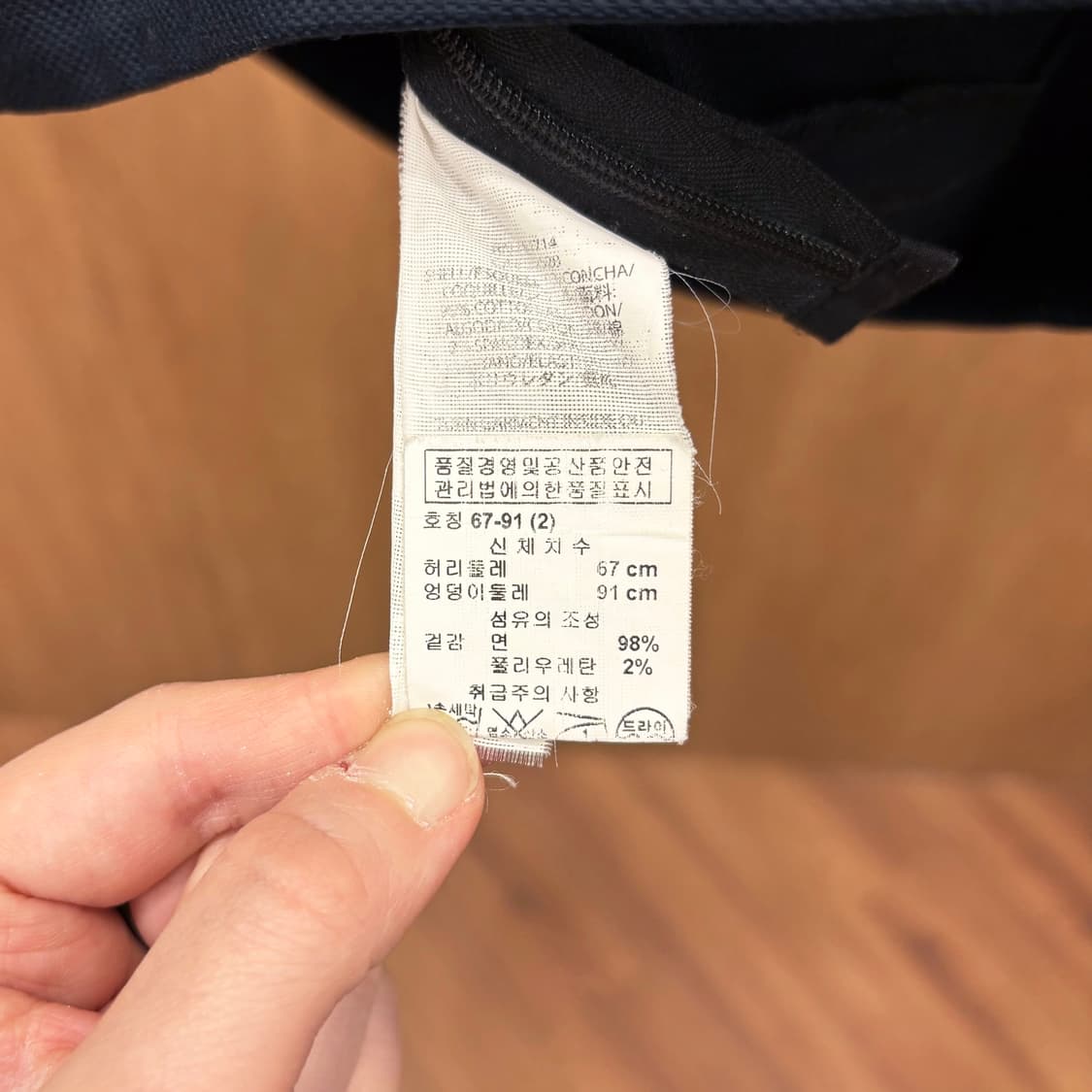 아르마니 익스체인지 미니 스커트 골드 아일렛 턱 밑단 절개 디테일 네이비 상품이미지8