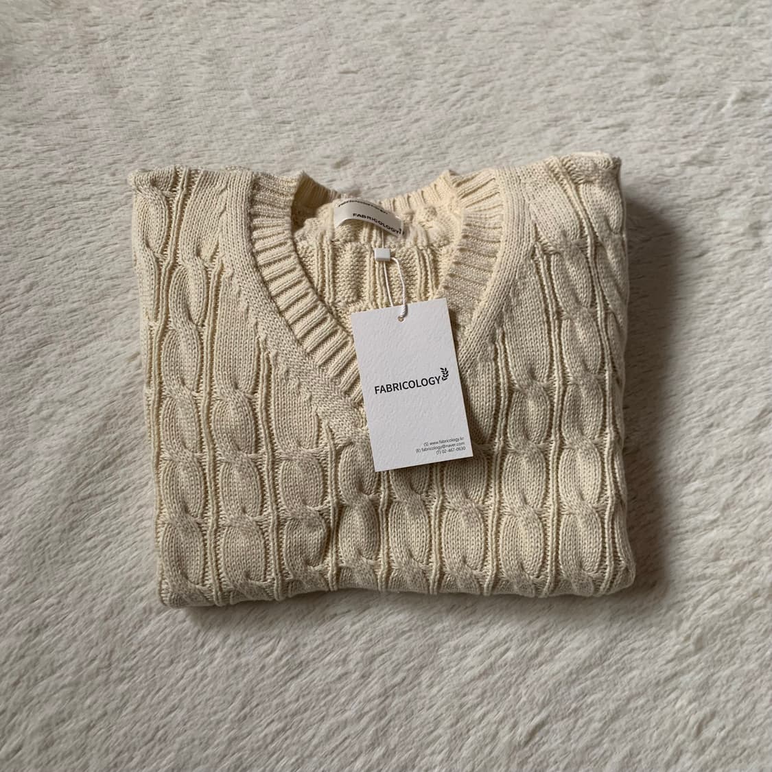 택O) 패브릭컬러지 롱 슬리브 케이블 니트 아이보리 상품이미지4
