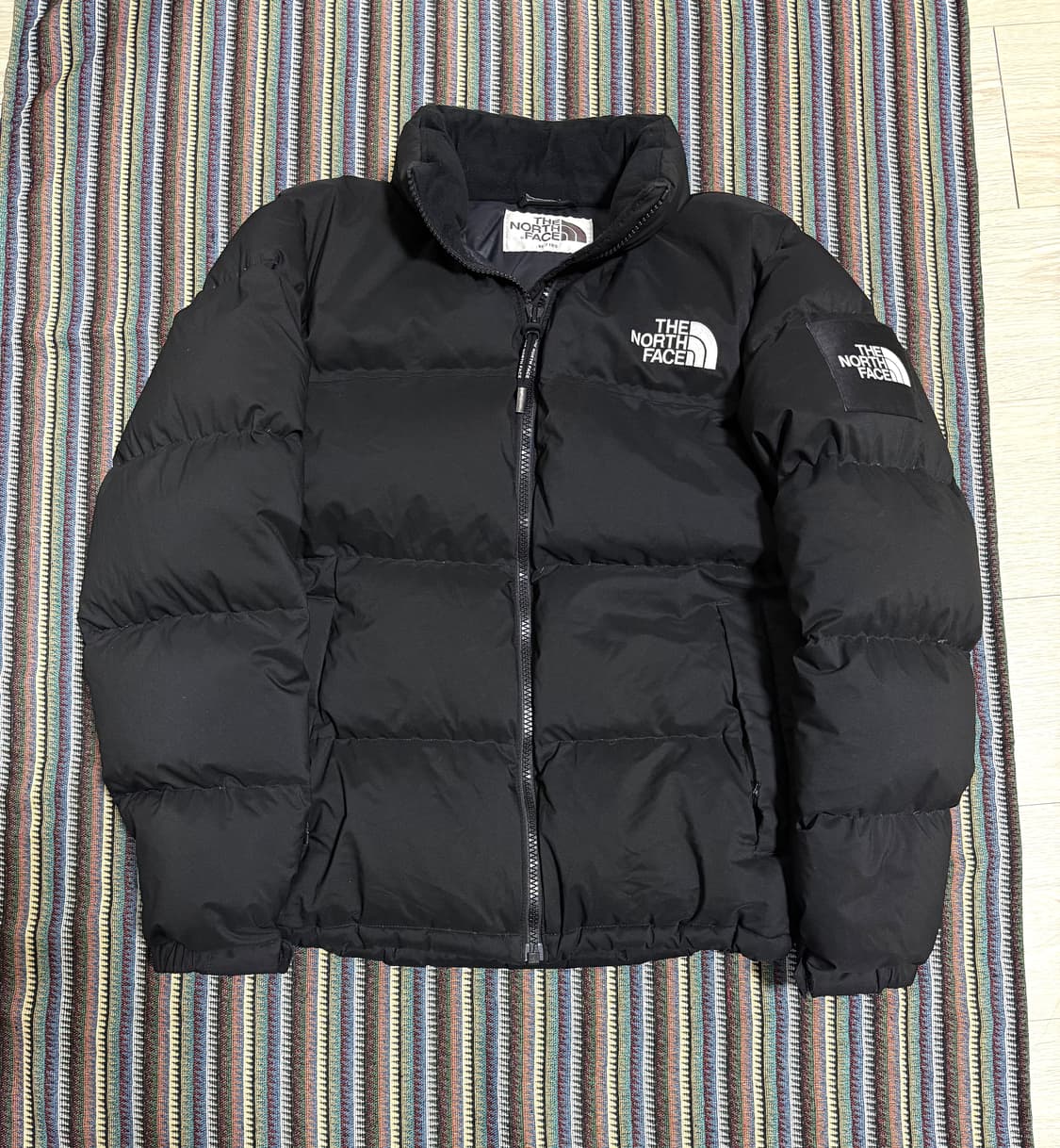 노스페이스 화이트라벨 눕시 패딩 상품이미지1