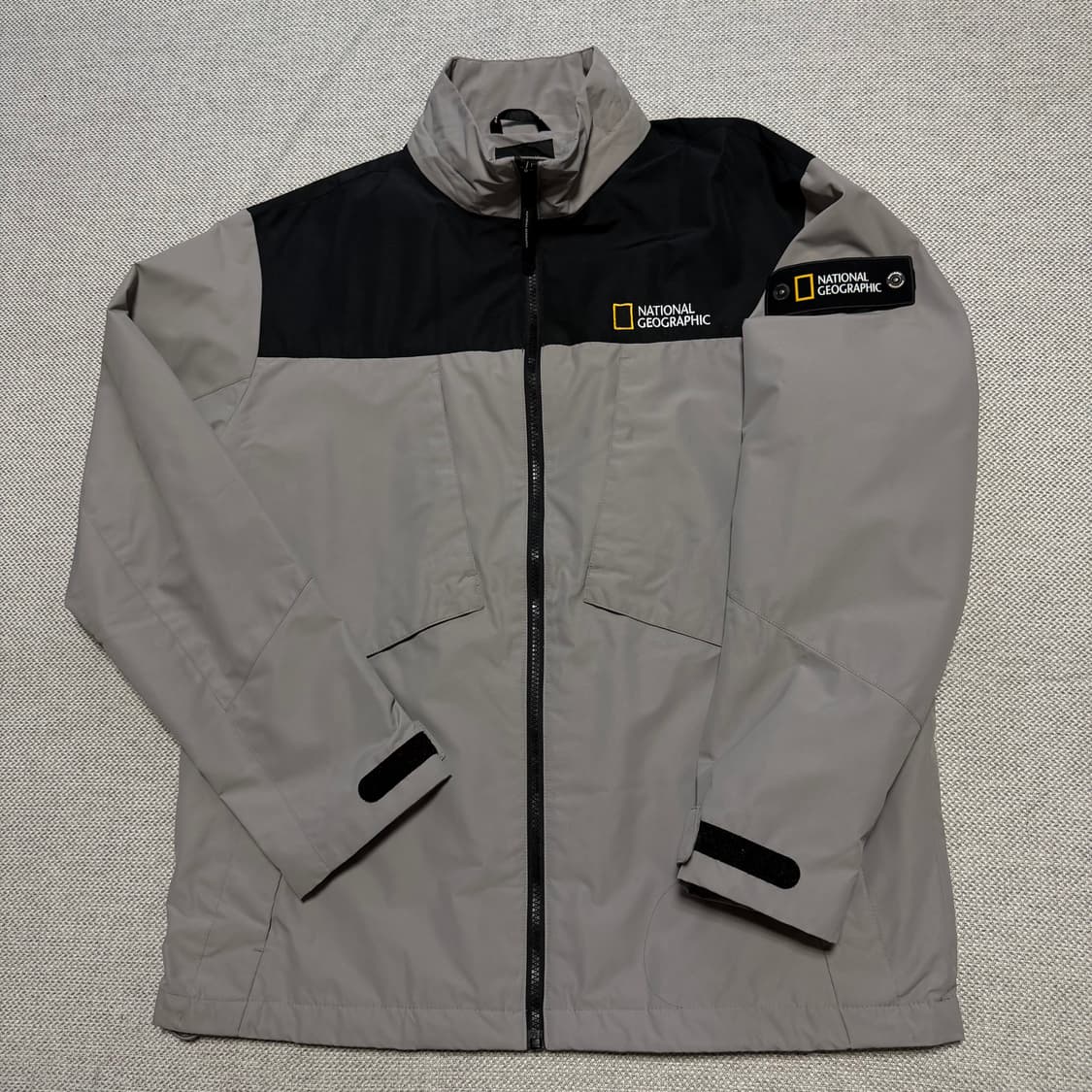 내셔널지오그래픽 배색 바람막이 자켓 상품이미지1