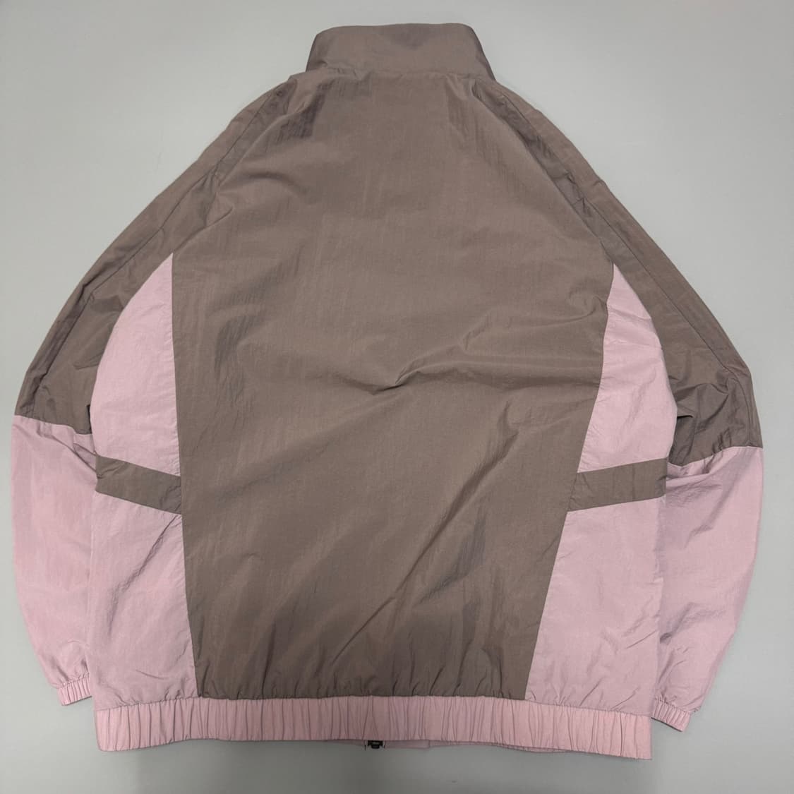 오클리(OAKLEY) 브라운 인디핑크 컬러블록 테크 하이넥 윈드브레이커 상품이미지7