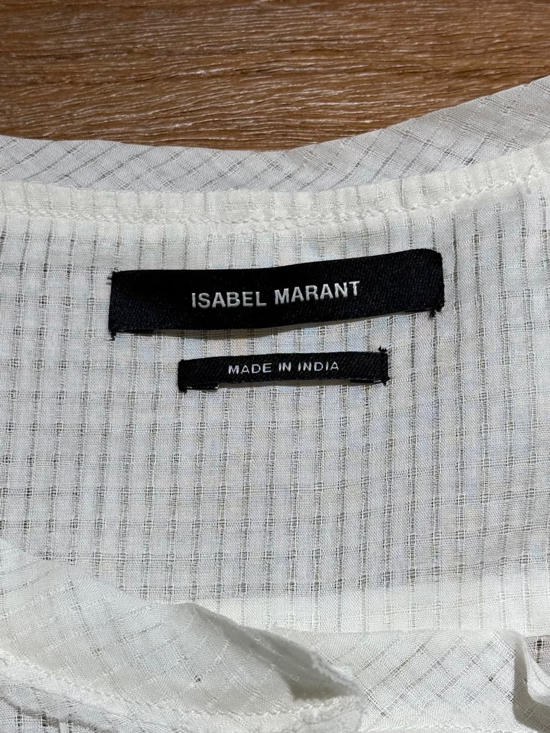 이자벨마랑 아이보리 러플 버튼 슬리브리스 블라우스 상품이미지7