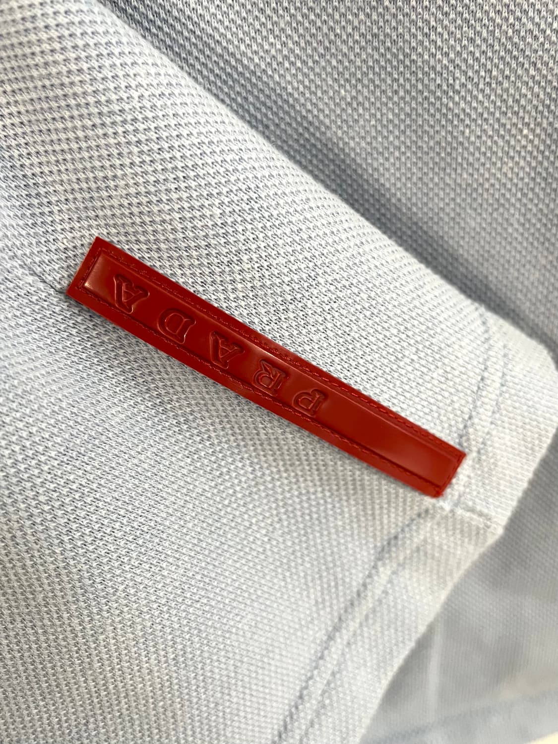 프라다 스포츠 백포켓 하프 집업 카라티 상품이미지6