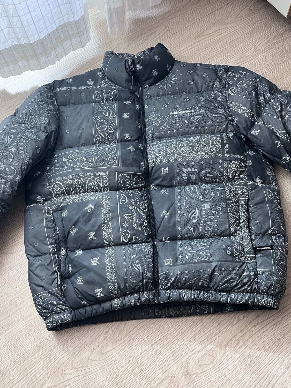 디스이스네버댓 페이즐리 문양 패딩 pertex 상품이미지1
