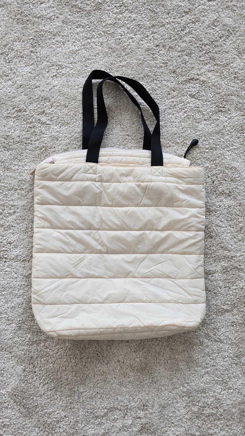 유니클로 아이보리 패딩가방 상품이미지1