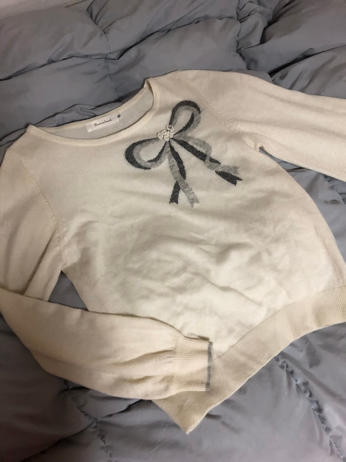 리본 장식 아이보리 니트 상품이미지1