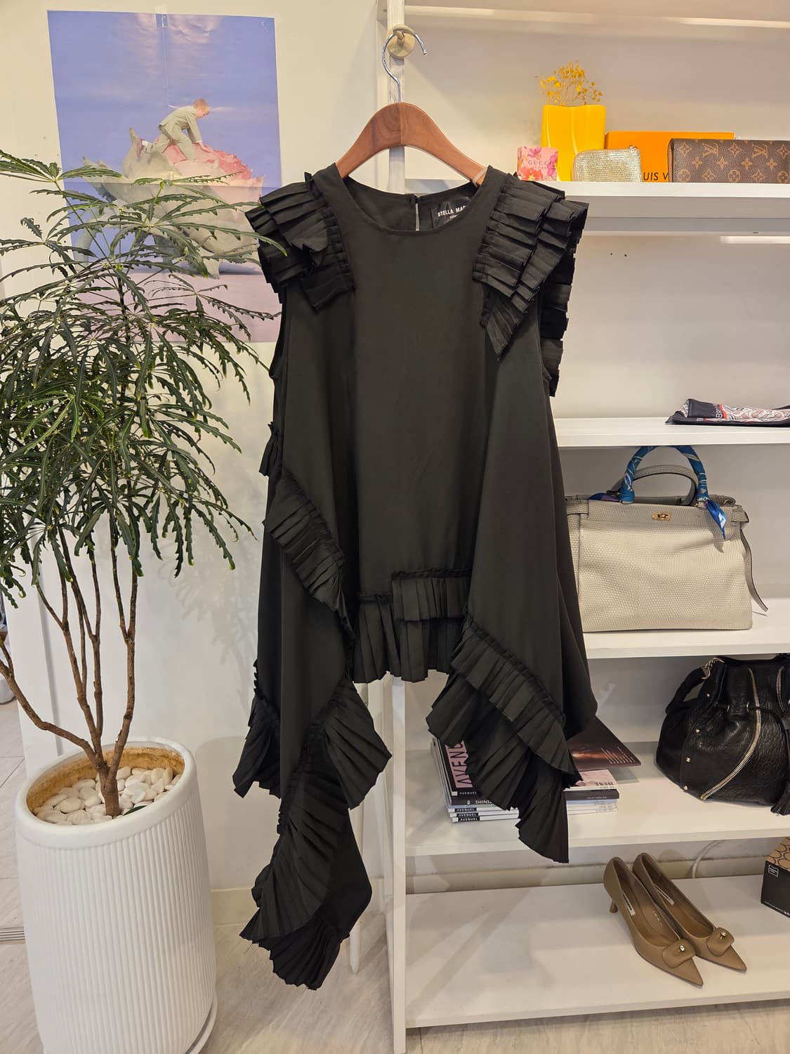 스텔라마리나  러플 주름 민소매 블라우스 상품이미지1