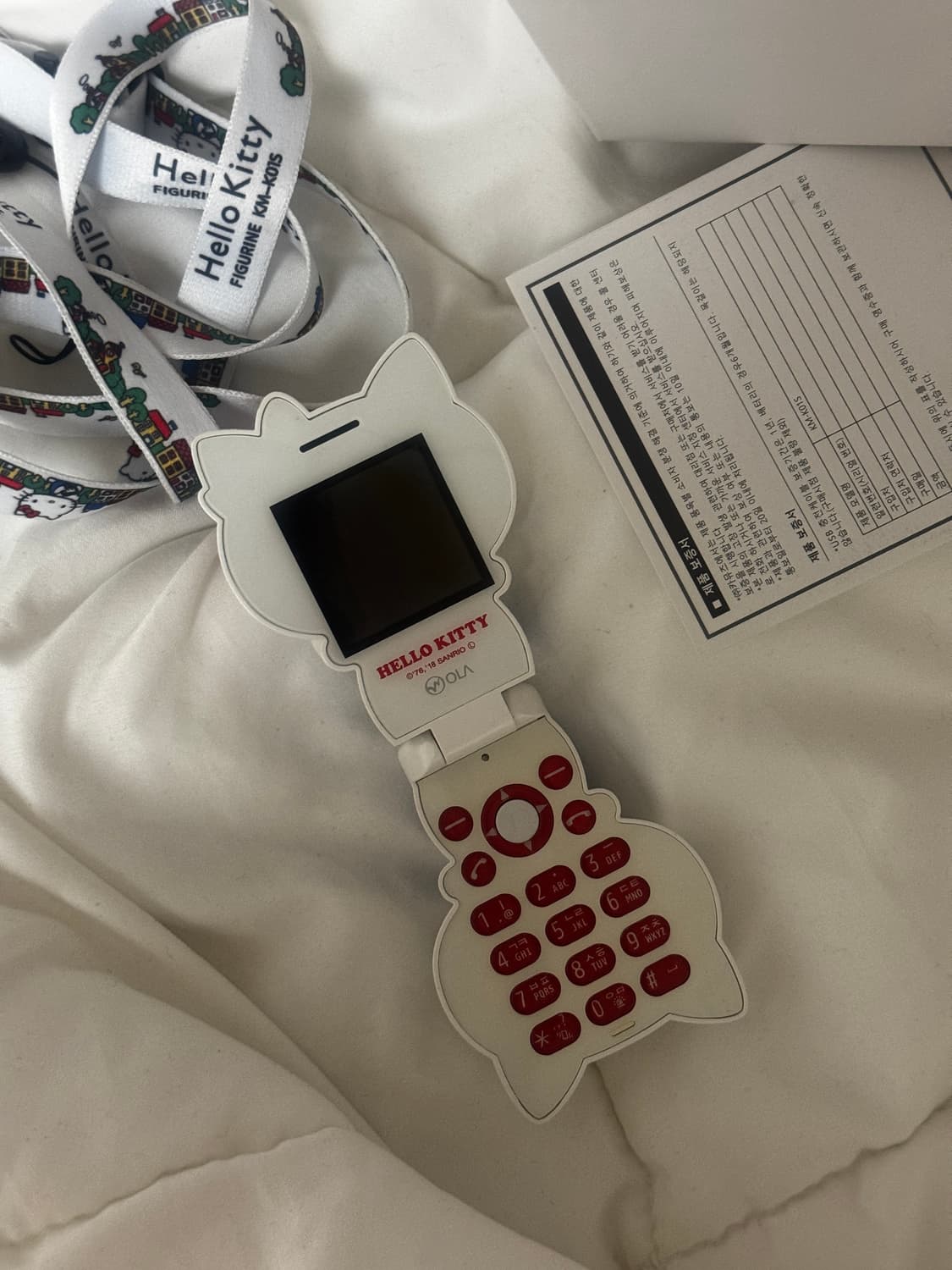 SK텔레콤 한정판 헬로키티폰 KM-K01S 자급제용 헬로키티 폴더폰 상품이미지1
