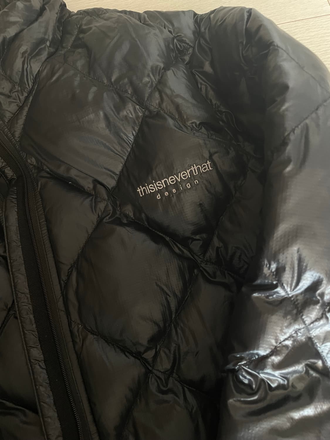 디스이즈네버댓 울트라라이트다운 경량패딩 블랙(S) 상품이미지1