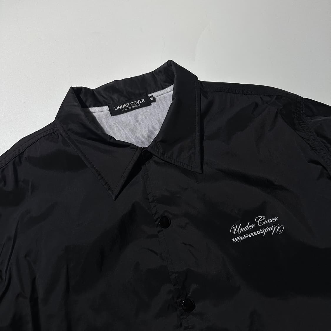언더커버 백로고 코치 자켓 블랙 상품이미지4