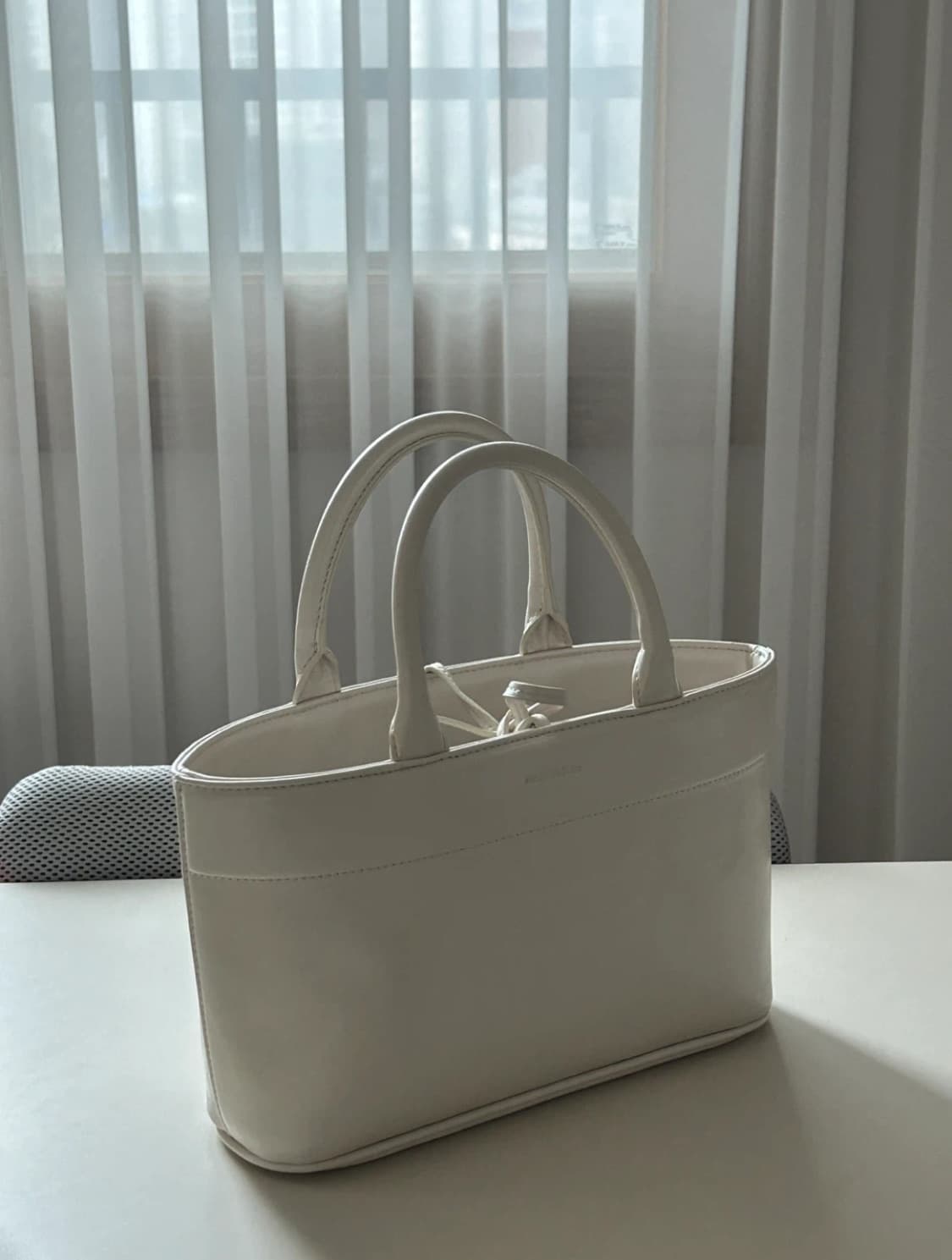 썸웨어버터 크림 토트백 상품이미지1