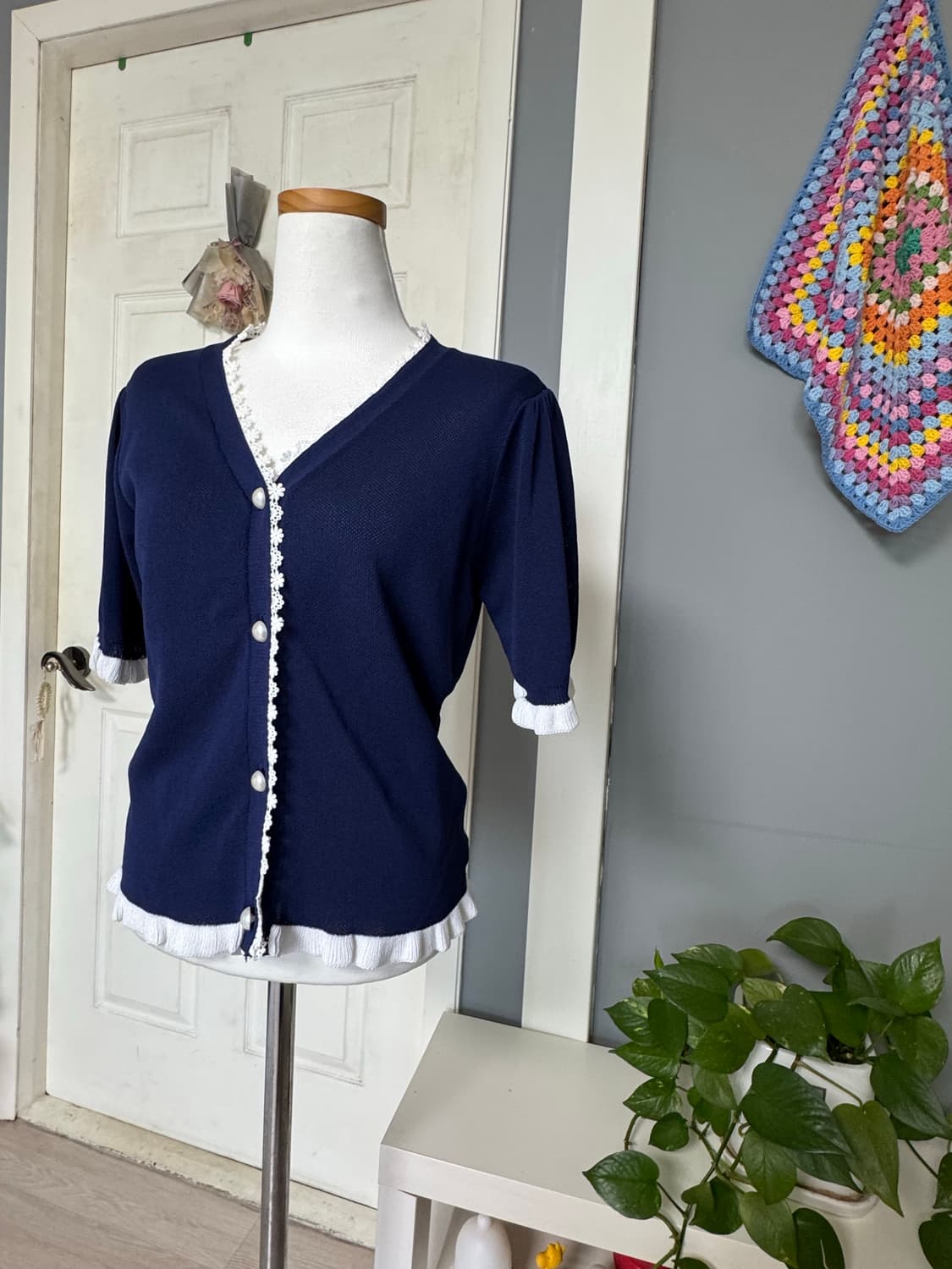 미착용 네이비 예쁜단추 니트반팔가디건 상품이미지1