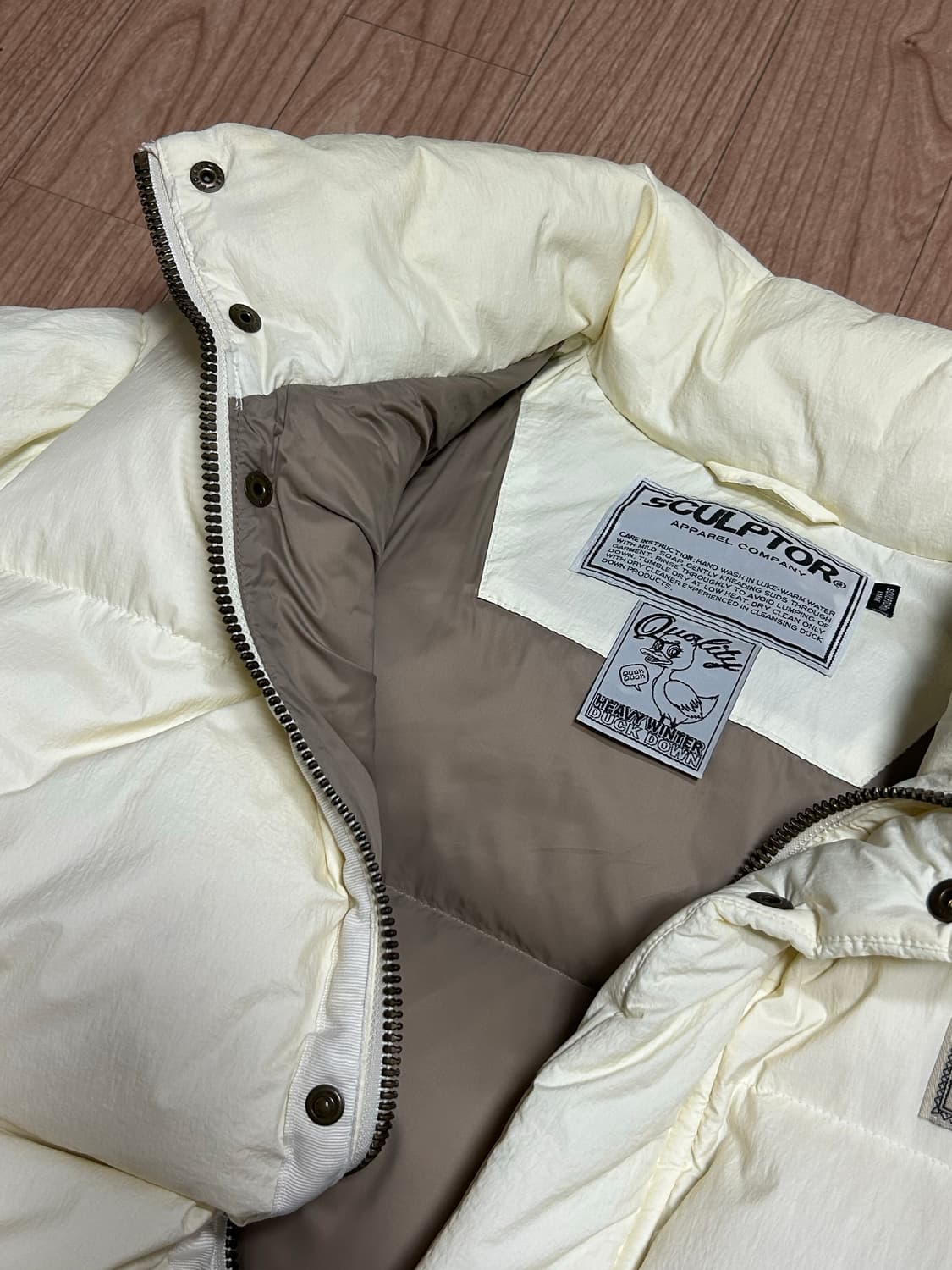 스컬프터 오버사이즈 푸퍼 다운(아이보리/L) 밀로우먼코이세이오디스커버리 상품이미지8