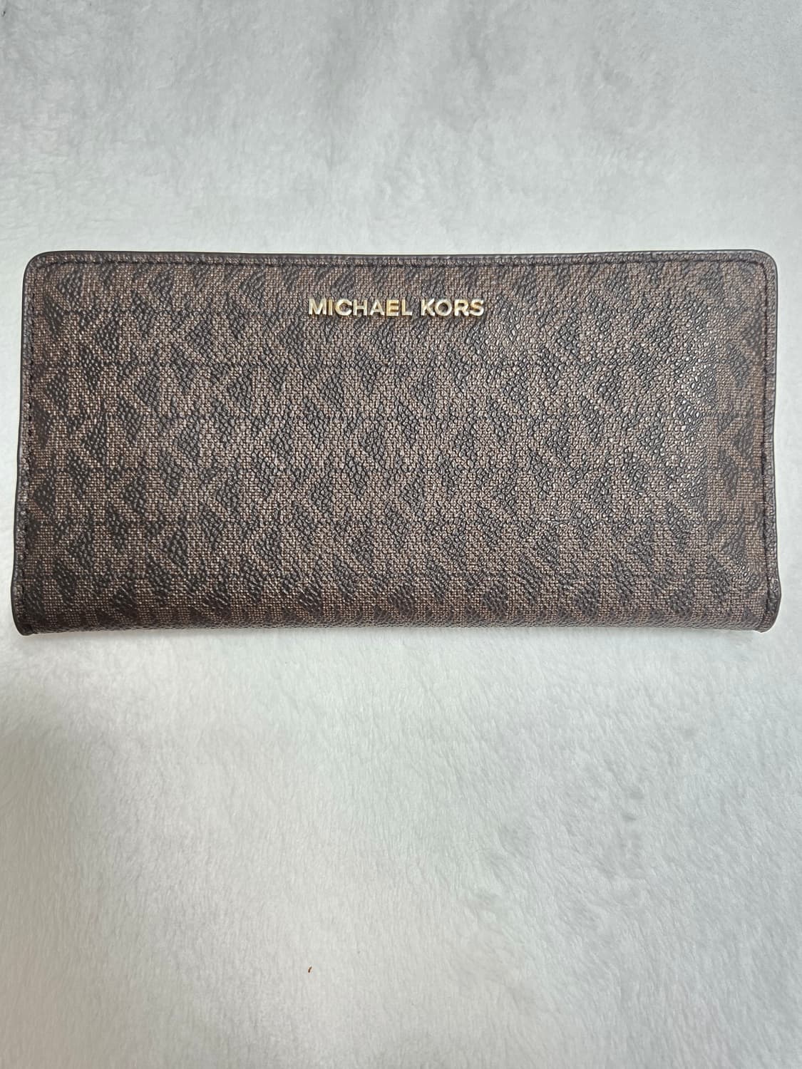 마이클코어스 브라운 로고 장지갑 상품이미지1