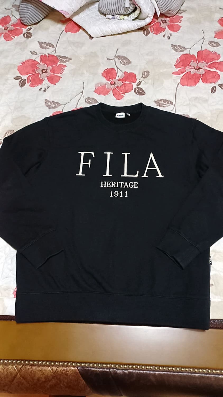 휠라 맨투맨 실측110 가슴61 기장73 상품이미지1