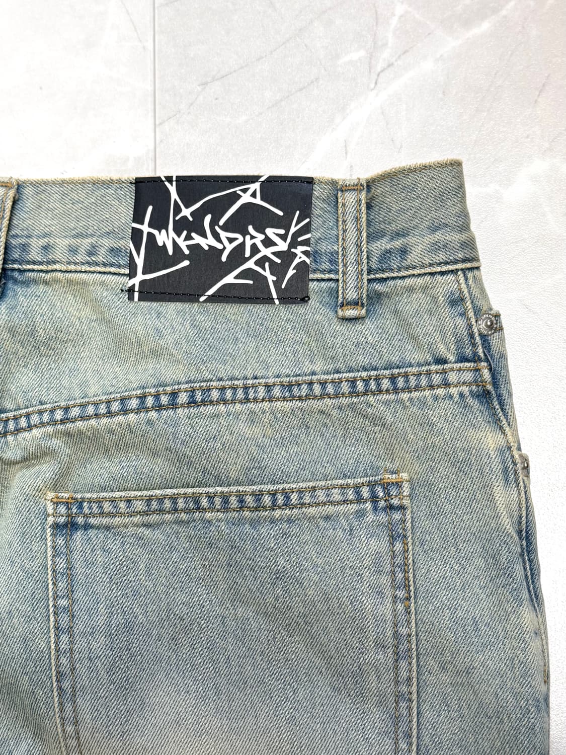 위캔더스 SKULL WASHED PANTS (S.DENIM) 상품이미지5