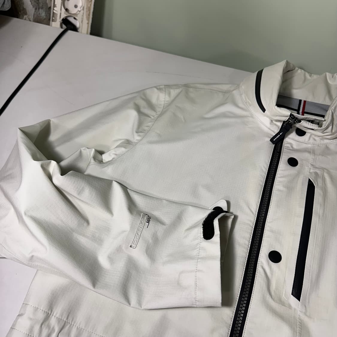 M-L 아이더 크림아이보리 허리스트링 히든후드 나일론자켓 상품이미지3
