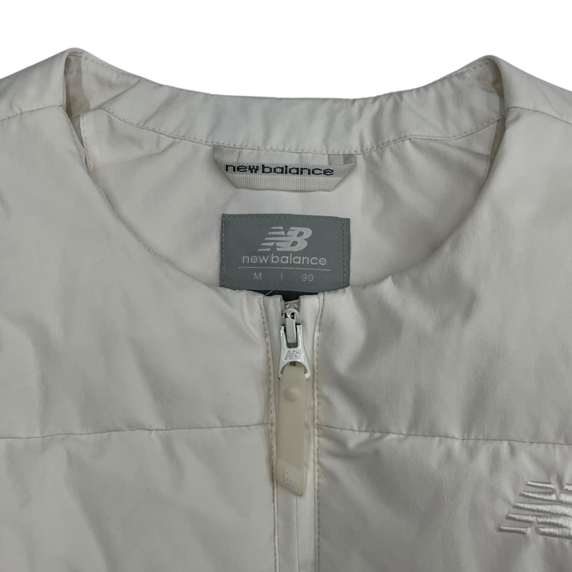 뉴발란스 센터로고 아이보리 투웨이 경량 패딩 M 상품이미지4