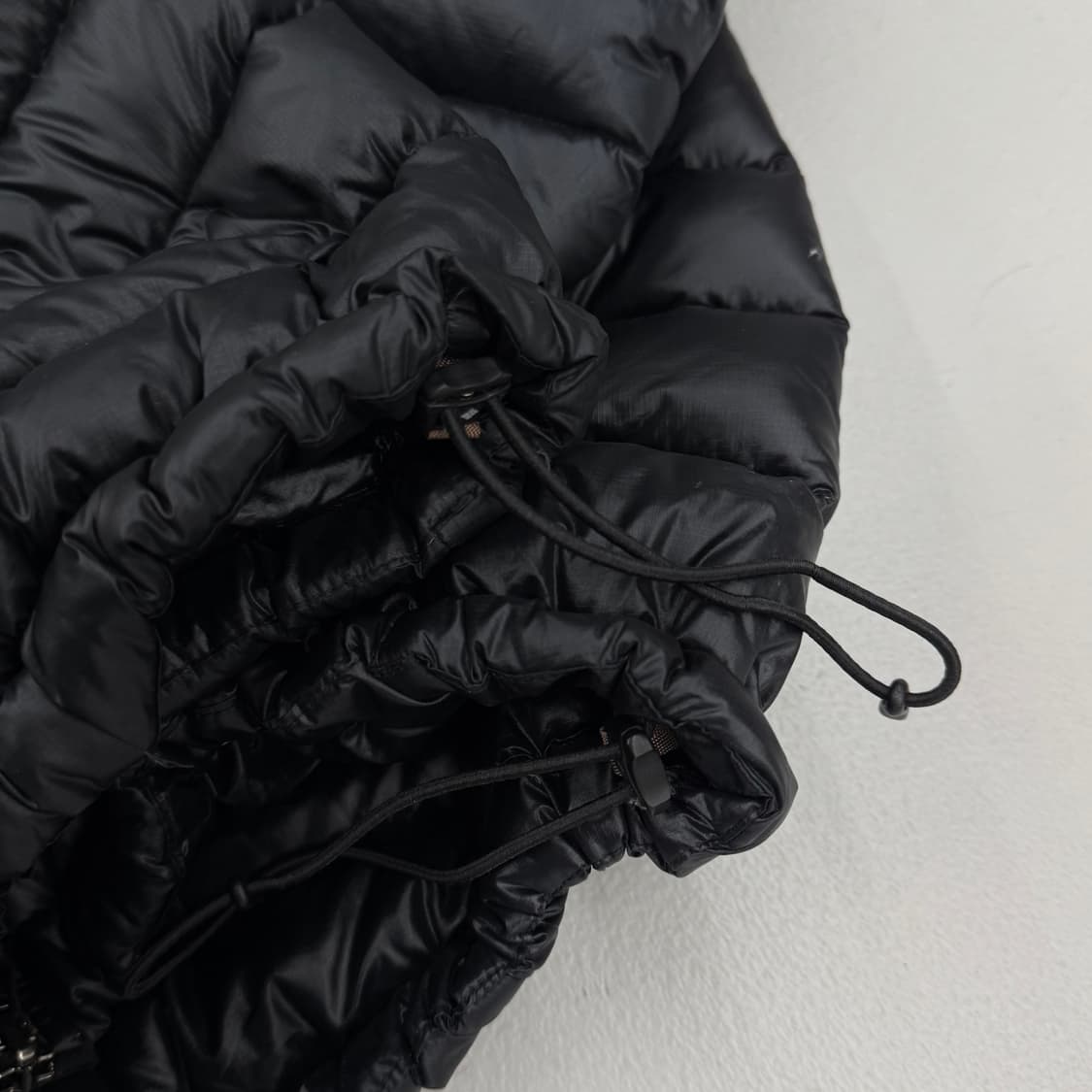 컬럼비아 고프코어 애벌레 퍼텍스 경량패딩 블랙 상품이미지7