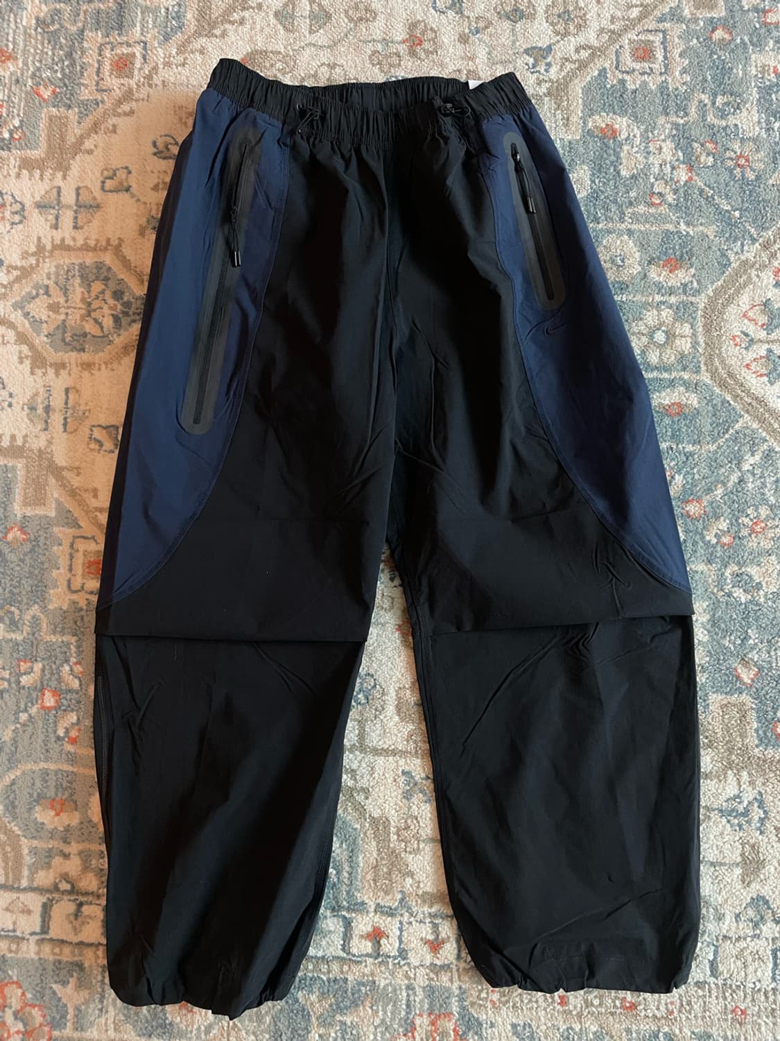 나이키 테크 드라이핏 우븐 컬러 블록 오버사이즈 블랙 팬츠 (새제품. X 상품이미지1