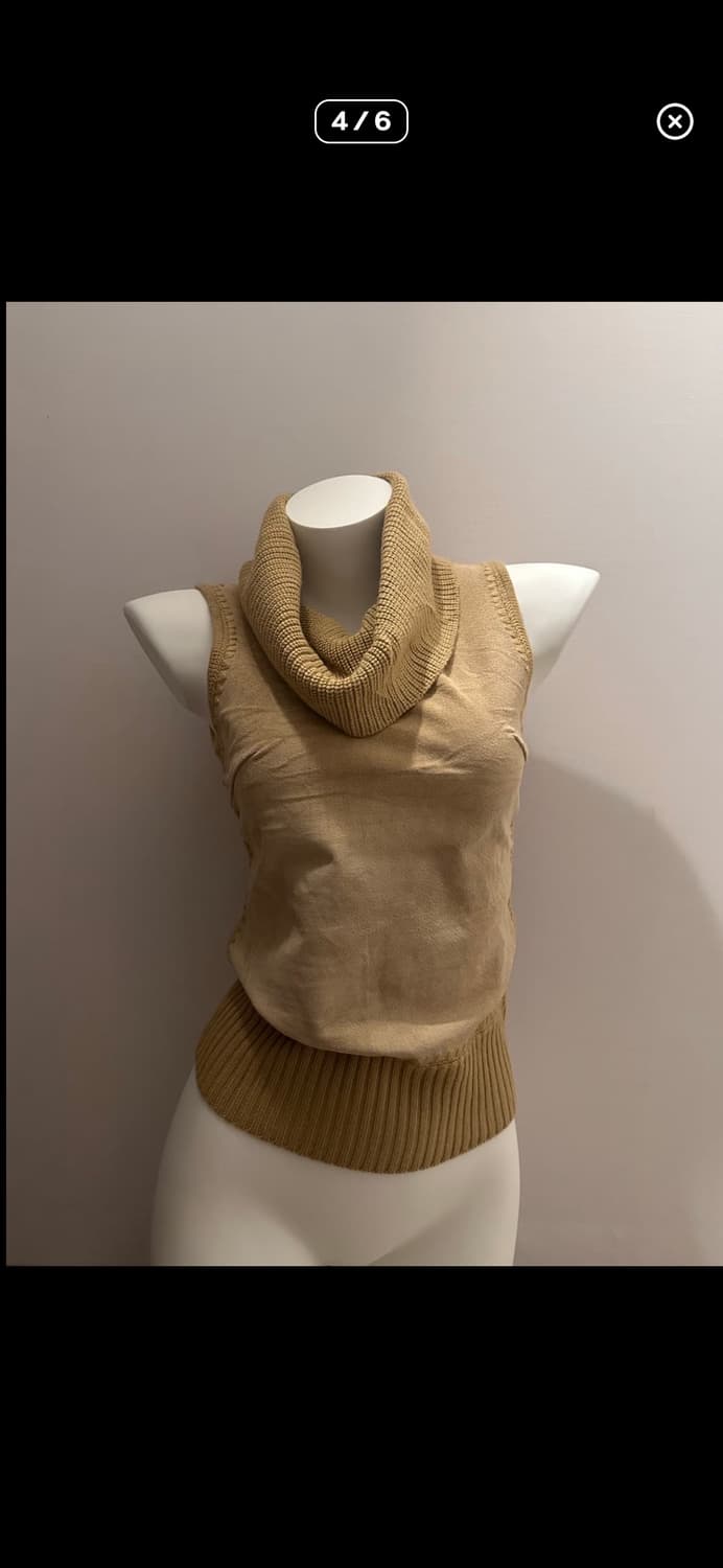 니트 터틀넥 슬리브리스 상품이미지1