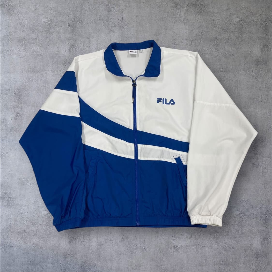 휠라 믹스 컬러 스몰 로고 올드스쿨 바람막이 상품이미지1