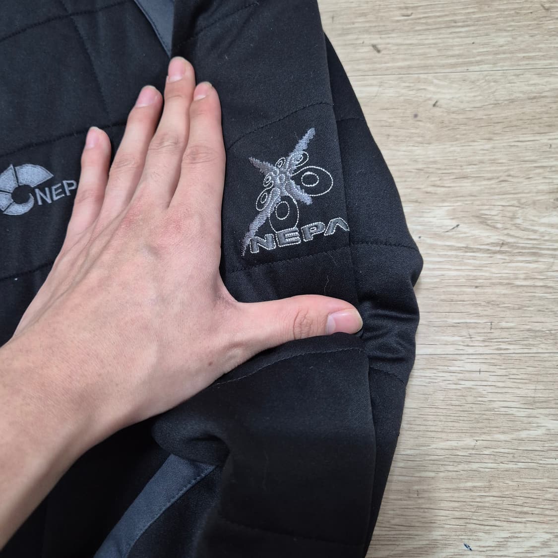 네파 산양 로고 경량패딩 점퍼 상품이미지4