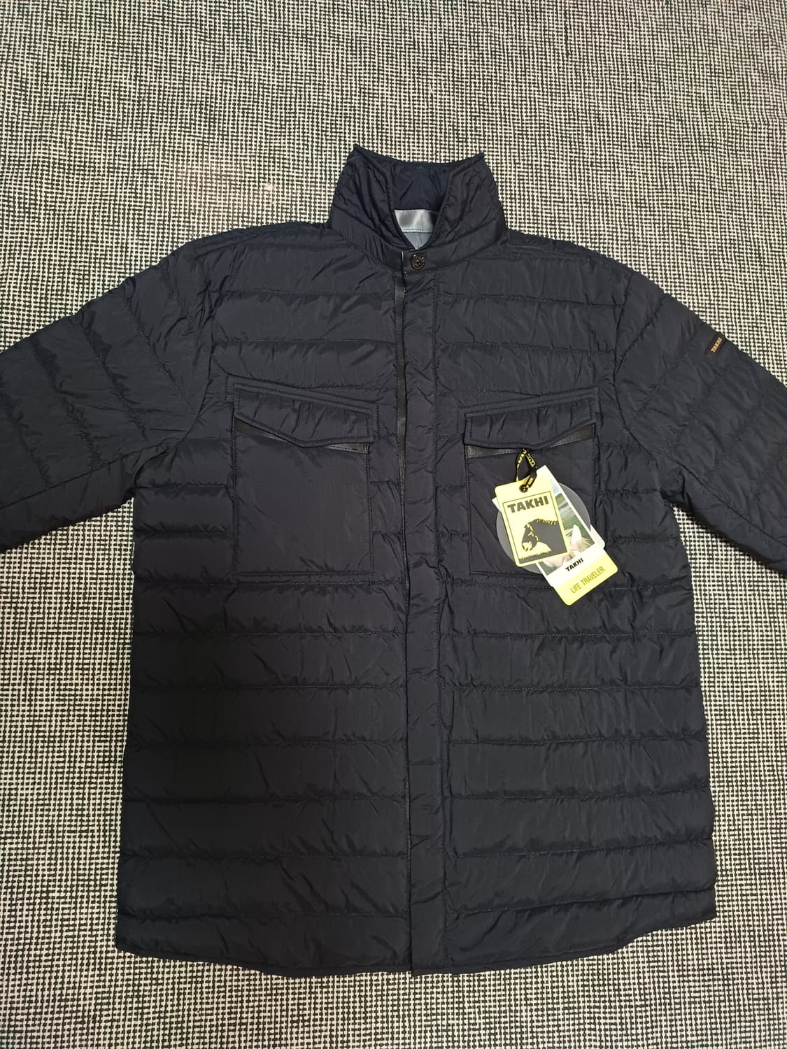 타키(TAKHI)**의 정품 오리털 경량 패딩 재킷  상품이미지1