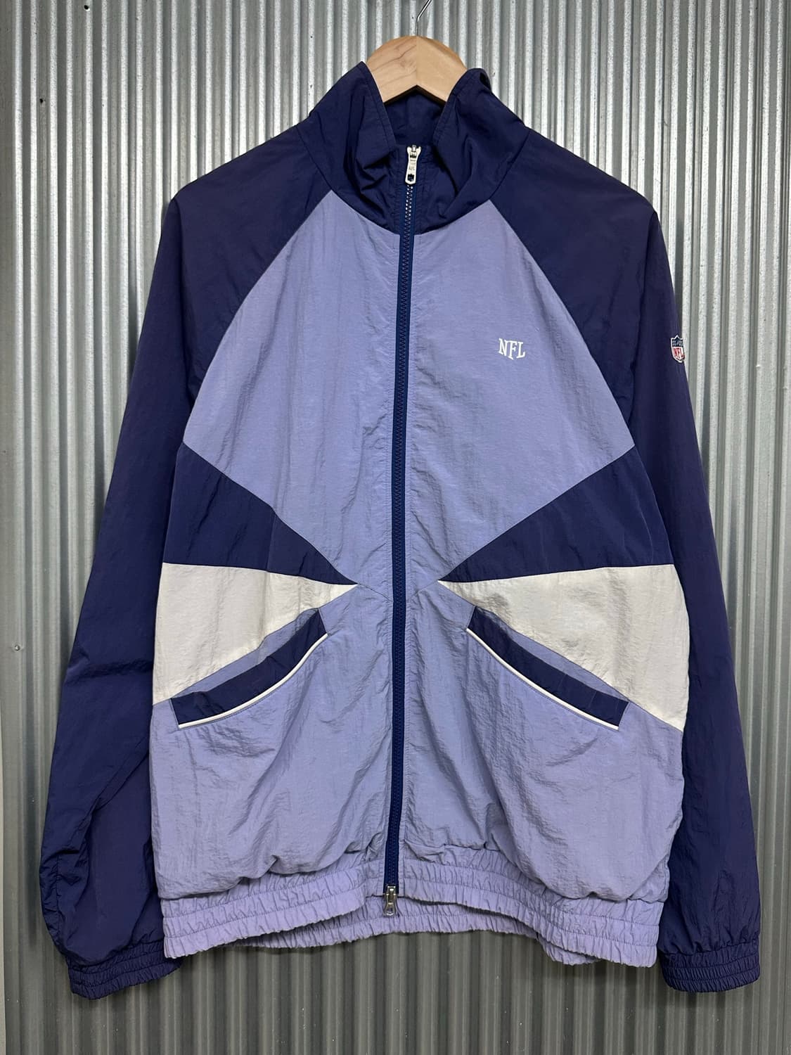 [L] NFL 팀 어패럴 배색 바람막이 자켓 상품이미지1