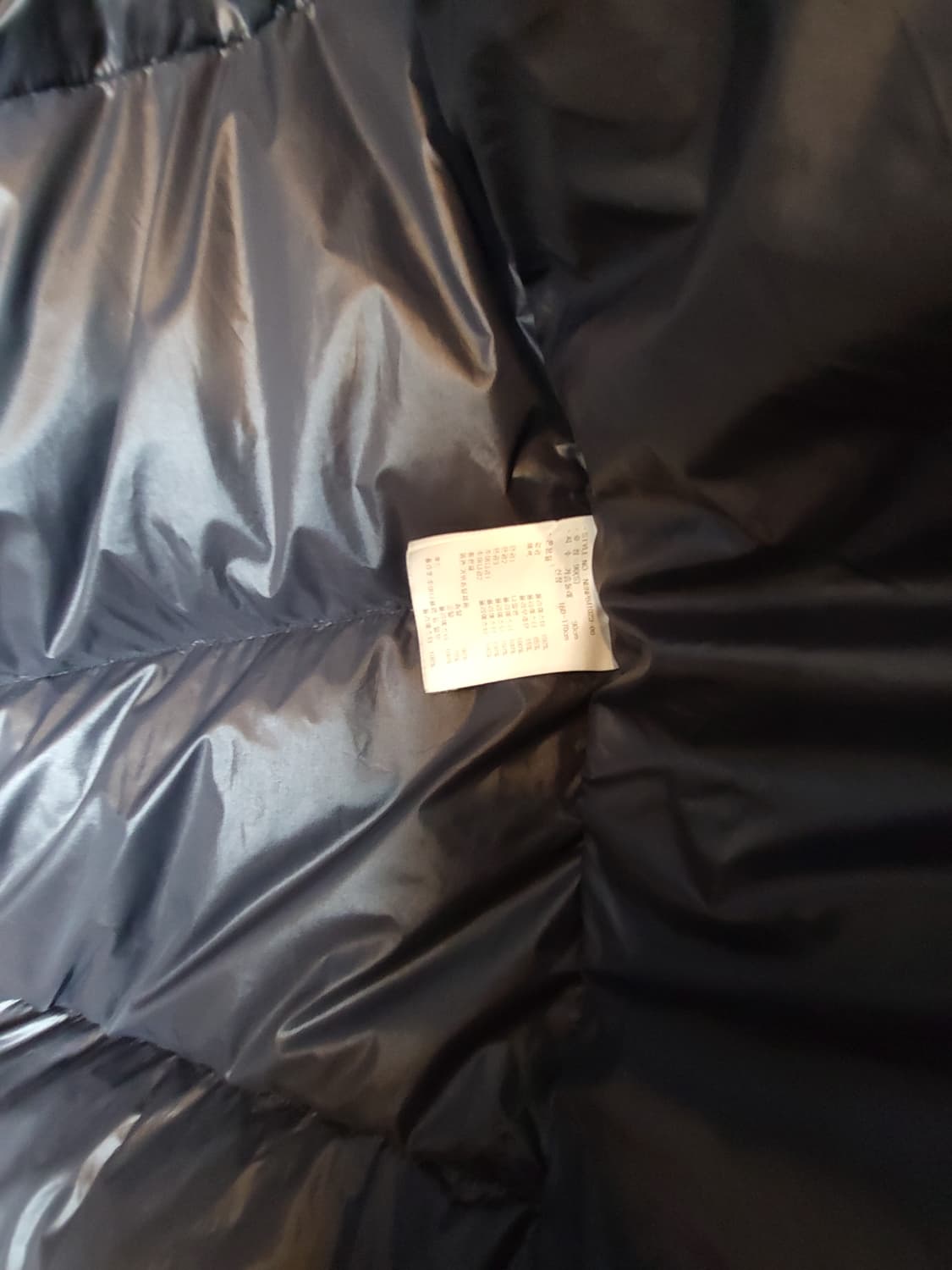 뉴발란스 발열구스롱패딩 블랙 90 S 새제품급 상품이미지10