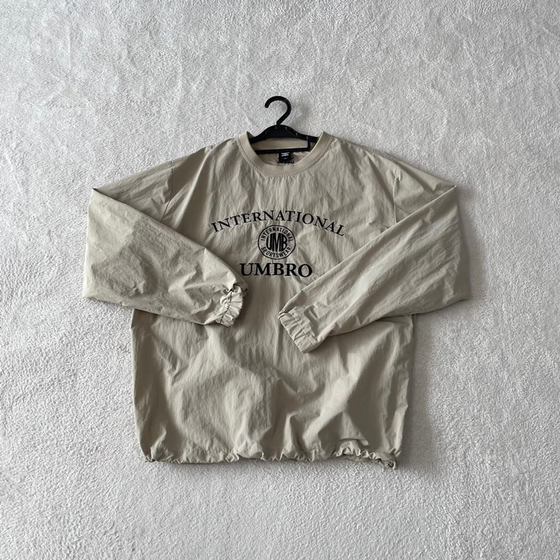 L 엄브로 웜업 바람막이 우븐 피스테 100 상품이미지1