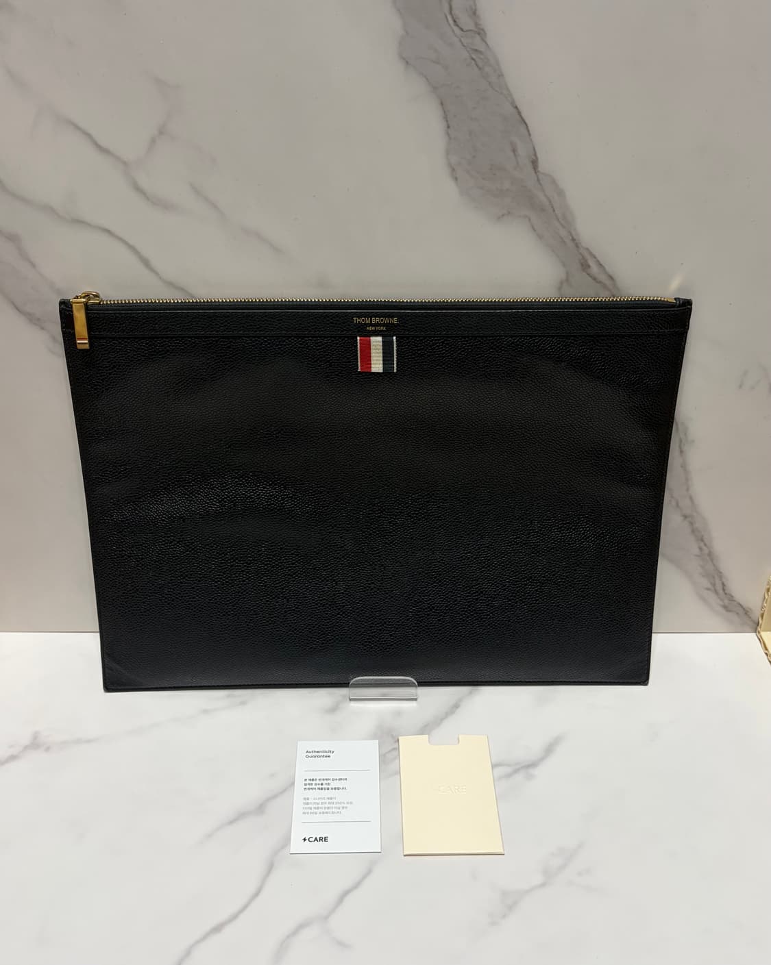 [정품] 톰브라운 도큐먼트 클라치 L사이즈 번개케어 상품이미지1
