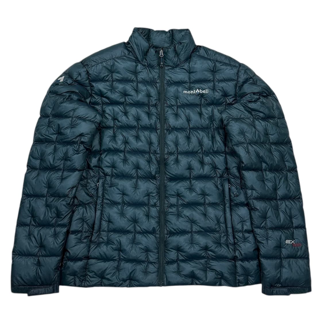 몽벨 플리즈마 1000 필파워 초경량 나일론 패딩 토바코블루 L 상품이미지1