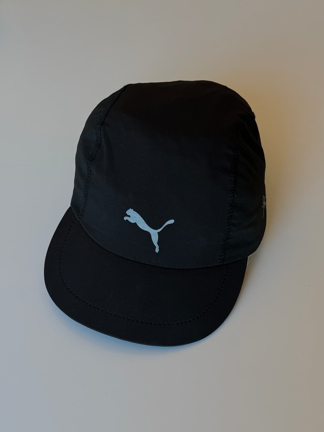 퓨마X헬로선라이즈러닝캡 상품이미지1