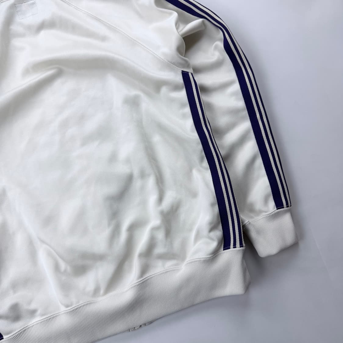 니들스 트랙 자켓 아이스화이트 퍼플라인 상품이미지10