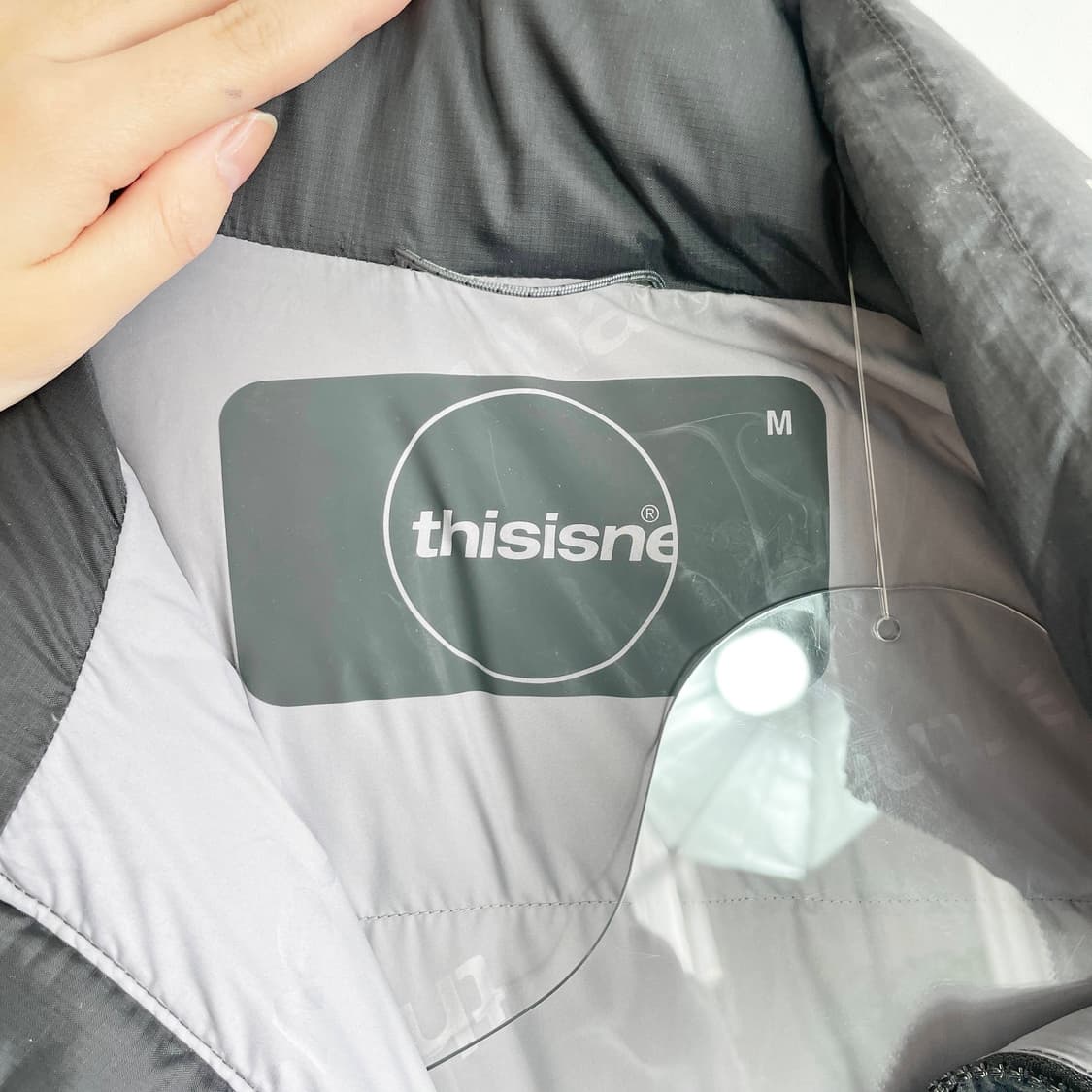 C1 디스이즈네버댓 카라 스펠아웃 다운 패딩 점퍼 M사이즈 상품이미지6