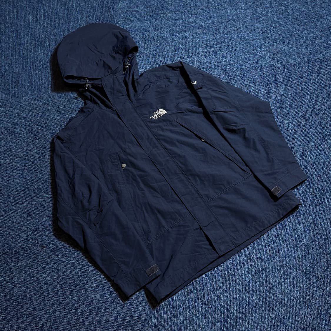 노스페이스 네이비 바람막이 후드 자켓 상품이미지1