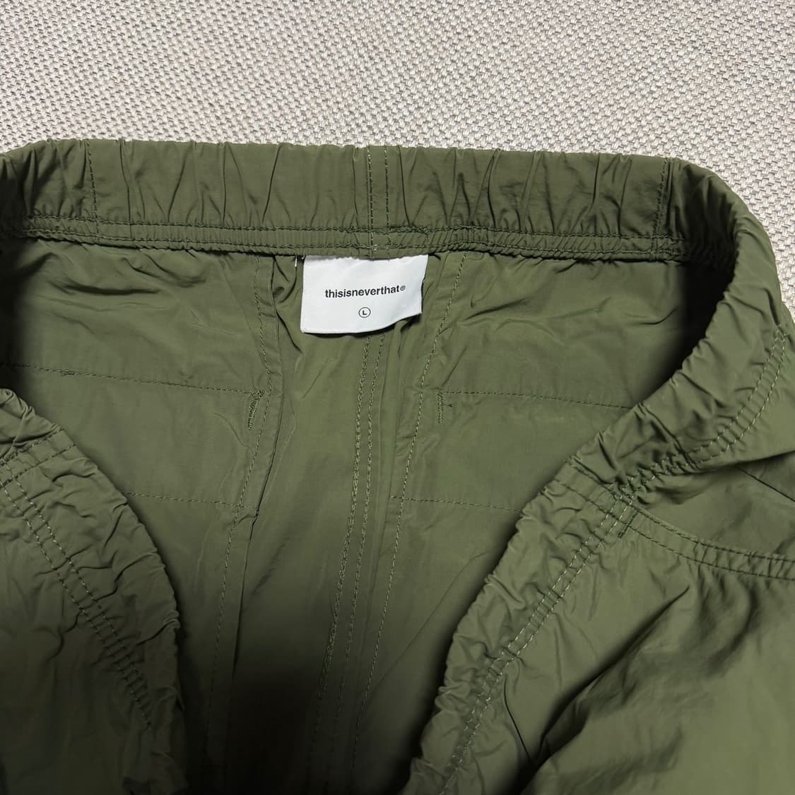 디스이즈네버댓 카키색 나일론 조거팬츠 상품이미지3