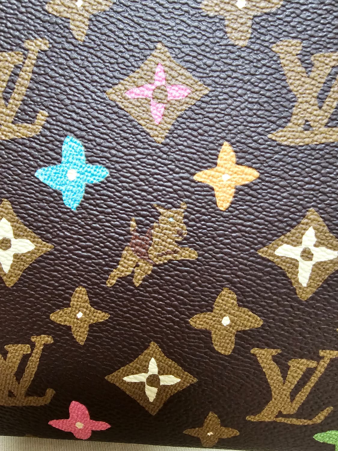 루이비통 타일러x퍼렐 강아지 초콜렛 포쉐트 클러치백 (새상품) 상품이미지7