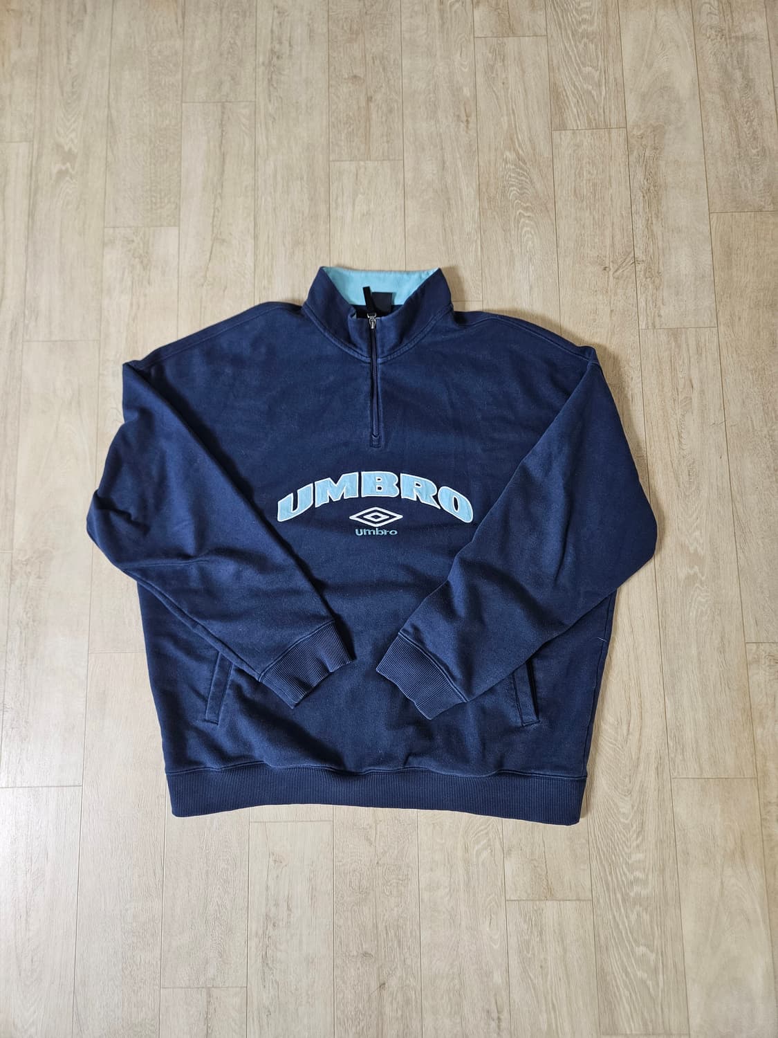 엄브로 하프집업 맨투맨 상품이미지1