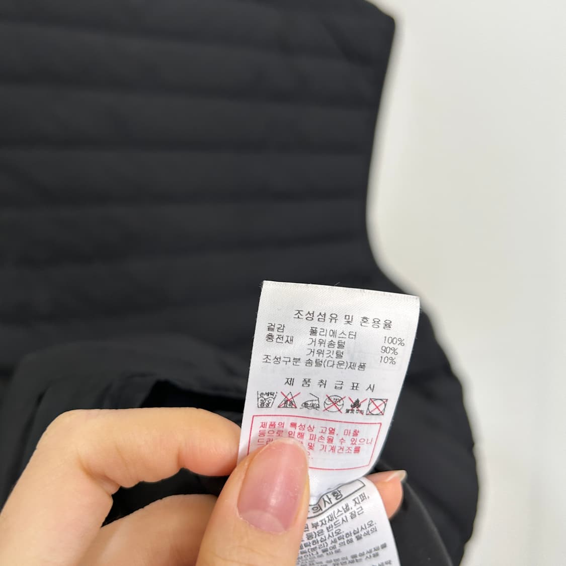 디스커버리 남성 구스다운 패딩조끼 105 블랙 상태최상 상품이미지5