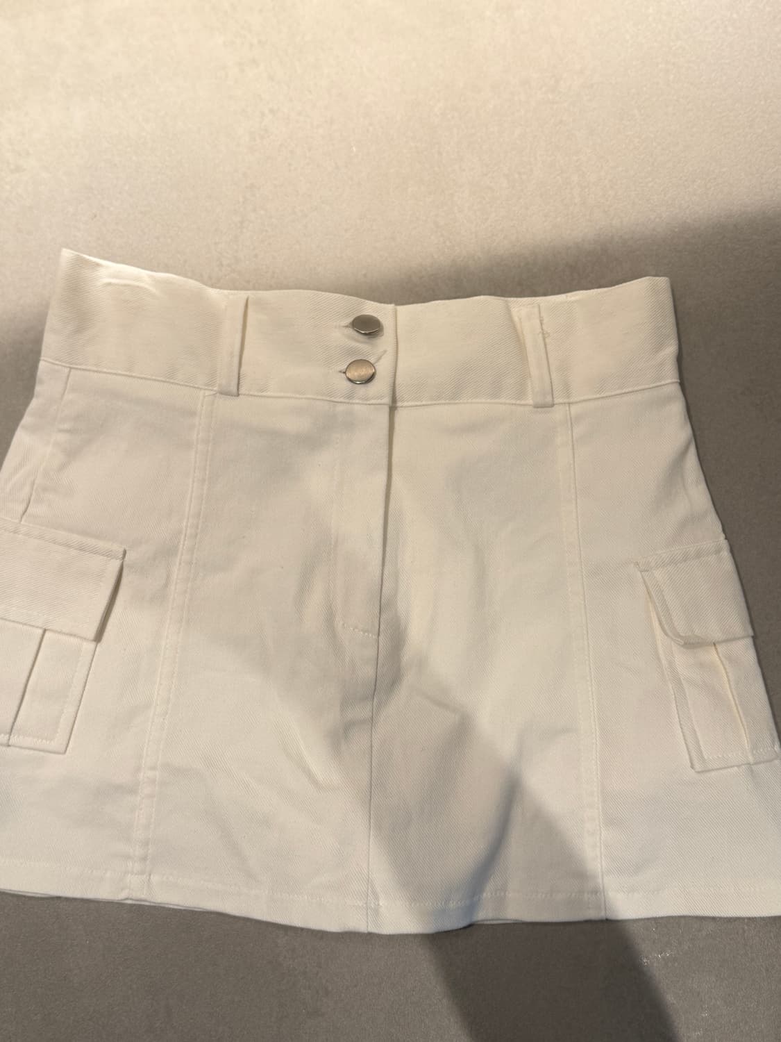 에이블리 지그재그 히프나틱 투버튼 미니스커트 M 상품이미지1