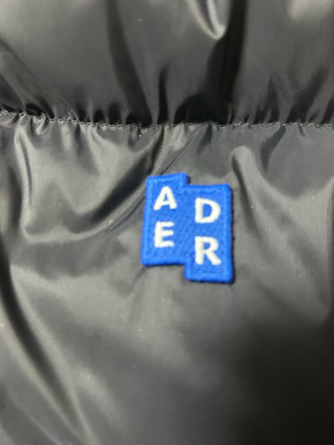아더에러 시그니피컨트 TRS/BL 태그 퍼퍼 자켓 상품이미지4