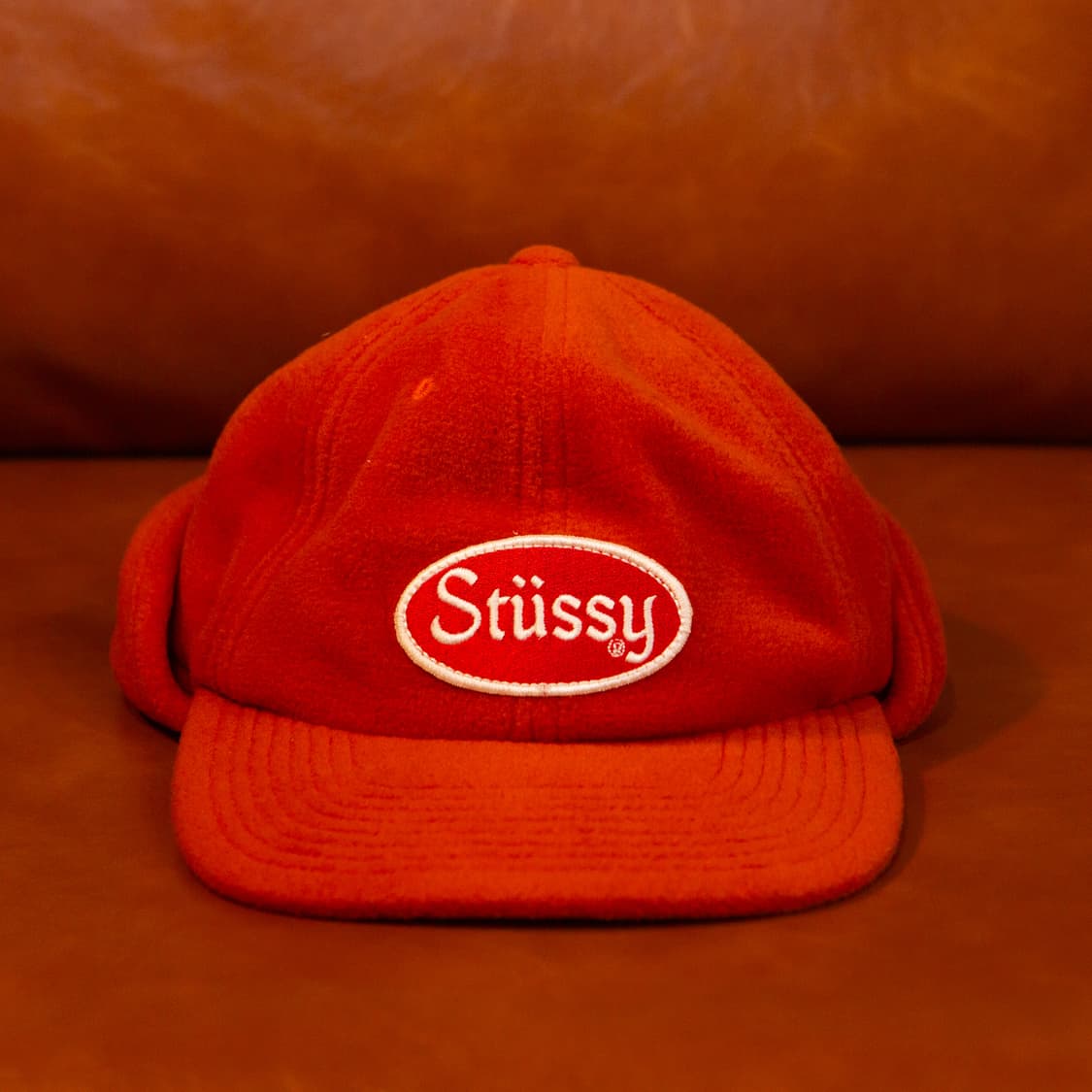 스투시 이어 플립 플리스 캡 오렌지 상품이미지1