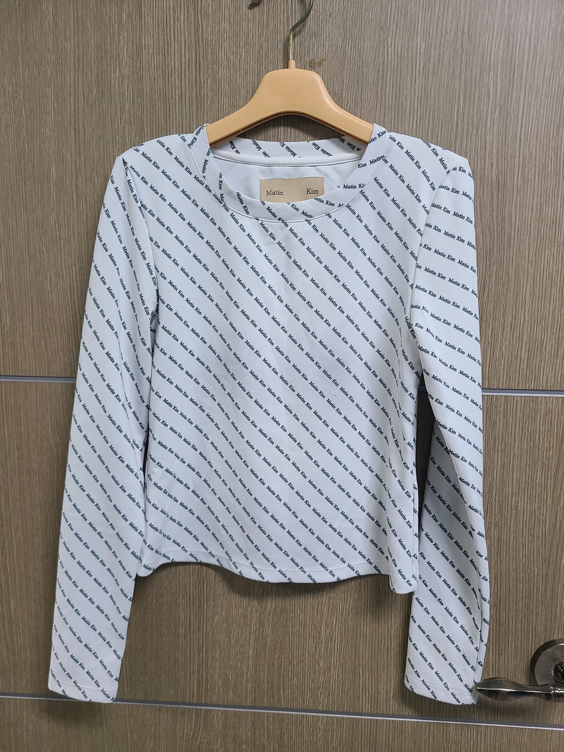 마뗑킴 로고 패턴 기능성 긴팔티  상품이미지1