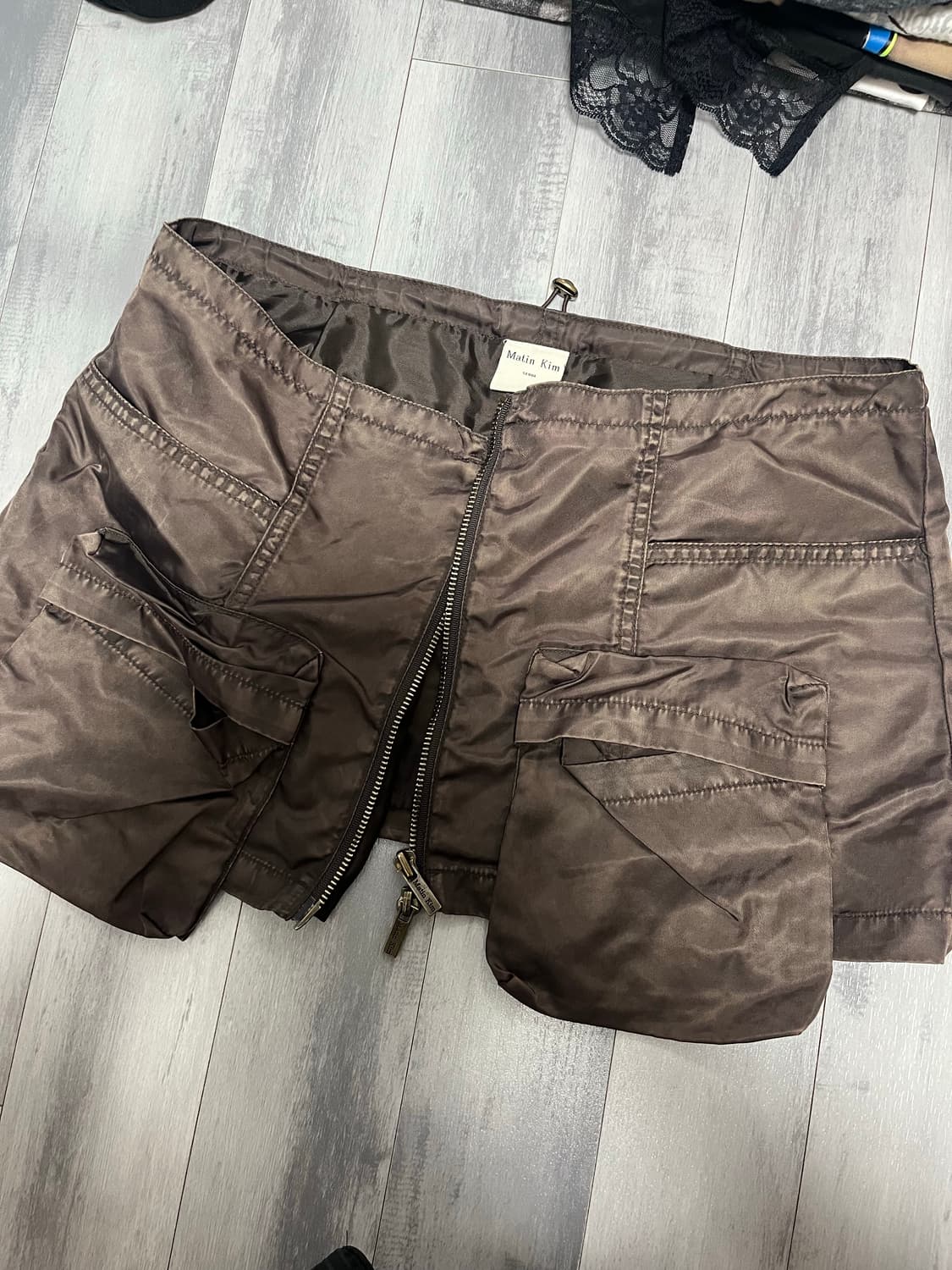 마뗑킴 레이어드 스터드 카고 스커트 상품이미지1