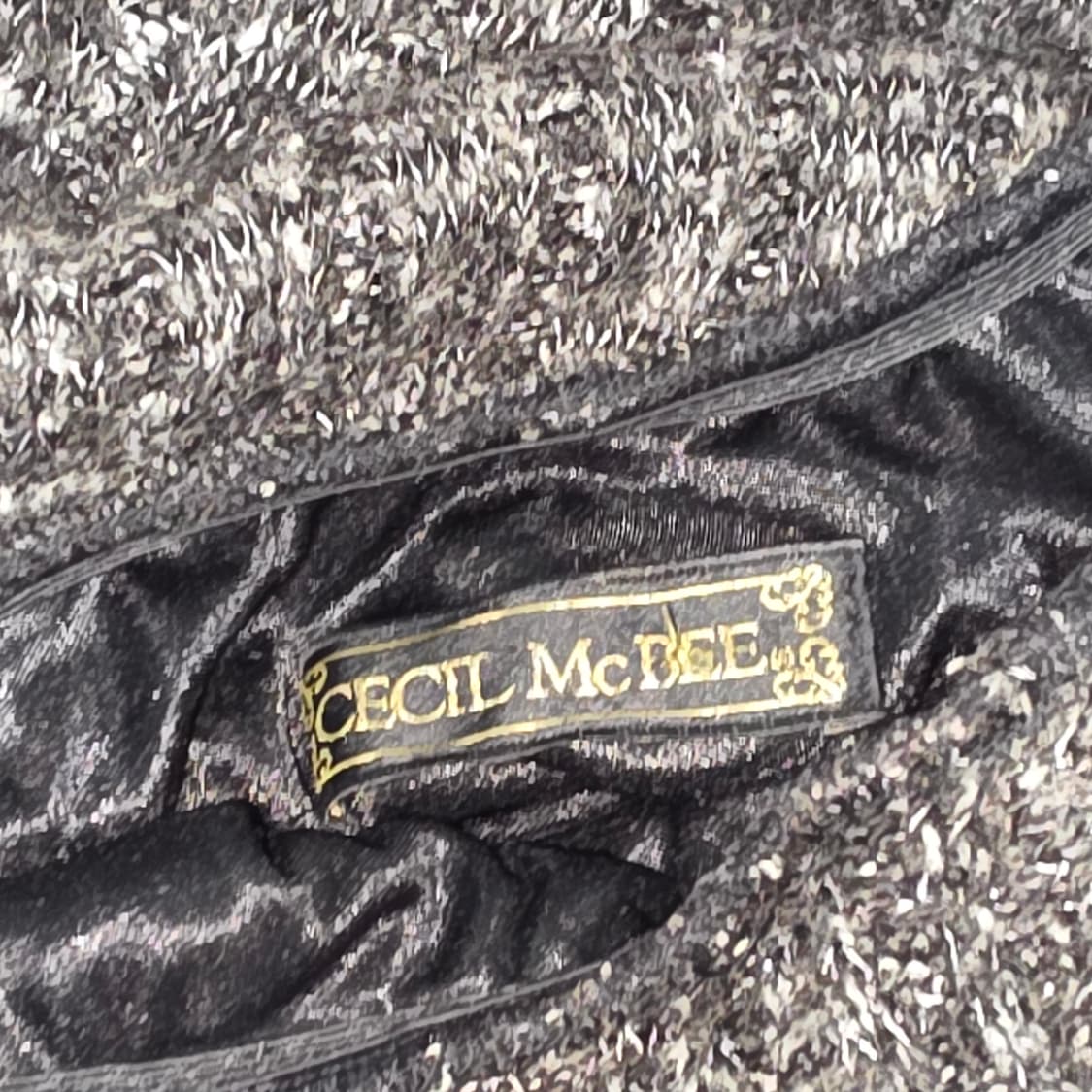 세실맥비)일본빈티지 고딕 오네갸루st 오프숄더 대대장 글리터 트위드니트 상품이미지4