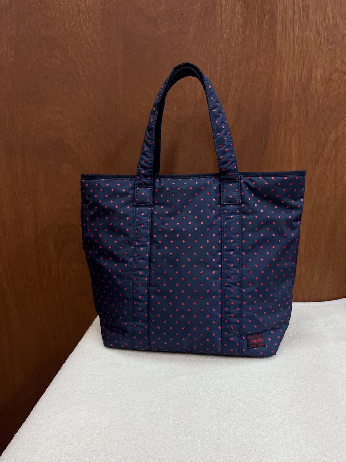 포터 별 패턴 숄더백 네이비 상품이미지1