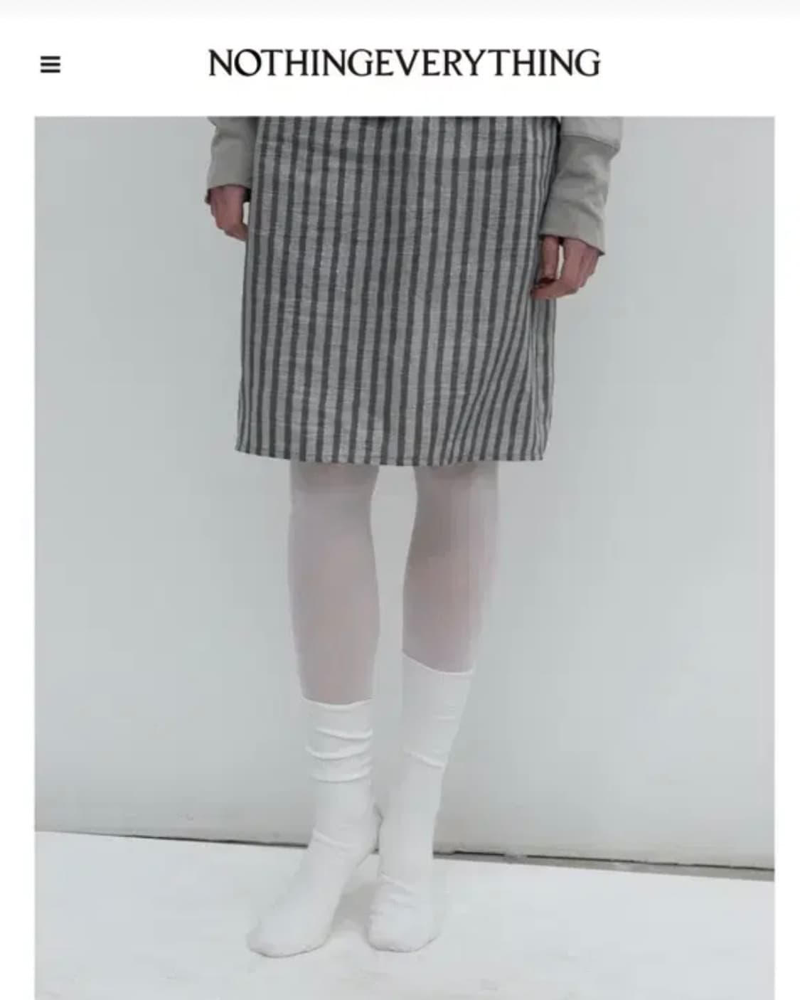낫띵에브리띵 시그니처 스트라이프 미디스커트 사이즈2 상품이미지1